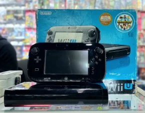 Consola Nintendo Wii U. Chipeado. Incluye caja, cables, accesorios, memoria USB para los juegos y microSD de 32 GB
